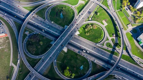 Timelapse-Aerial-view-of-a-freeway-intersection-traffic-trails-in-Moscow.